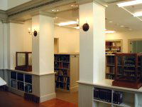 The Research Library opens off the two-story Reading Room and has space for books, periodicals, and other research aids.