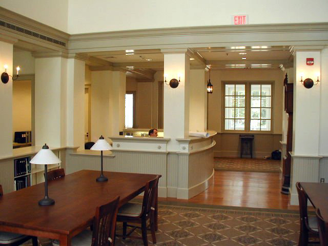 Visitors to the Archie K. Davis Center will be able to check in at the reception desk, which is centrally located between the front entrance and gallery (background) and the two-story Reading Room (foreground).